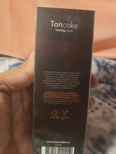 Load image into Gallery viewer, Tancake tanning oil
